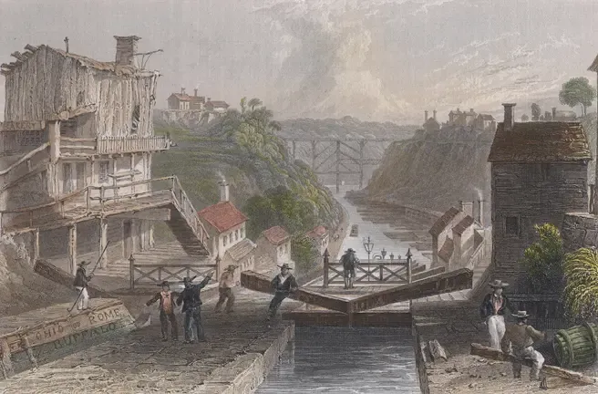 Hand-colored 1839 engraving of the stair-step locks at Lockport on the Erie Canal, with canal boats and workers in the foreground
